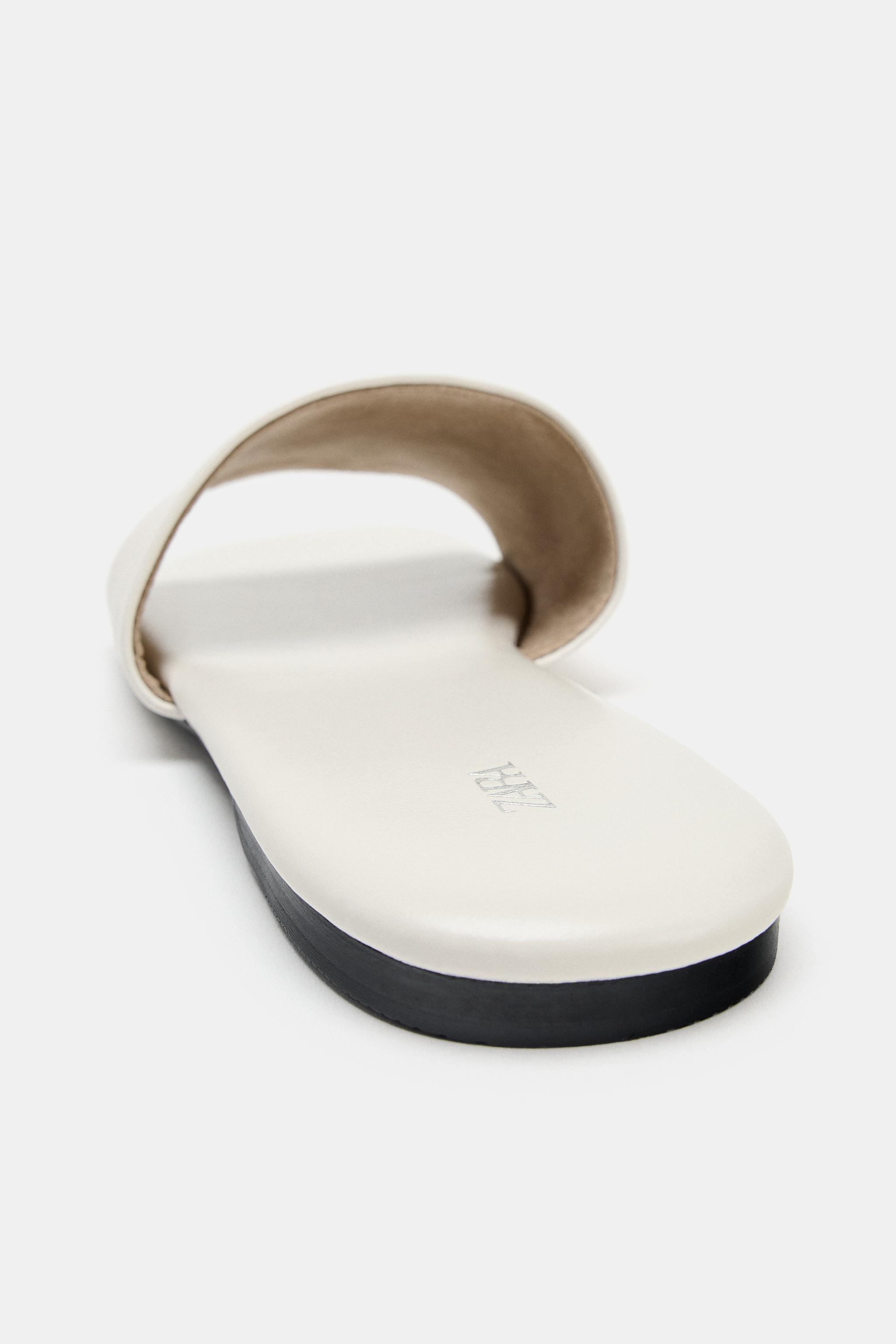 FLAT LEATHER SANDALS